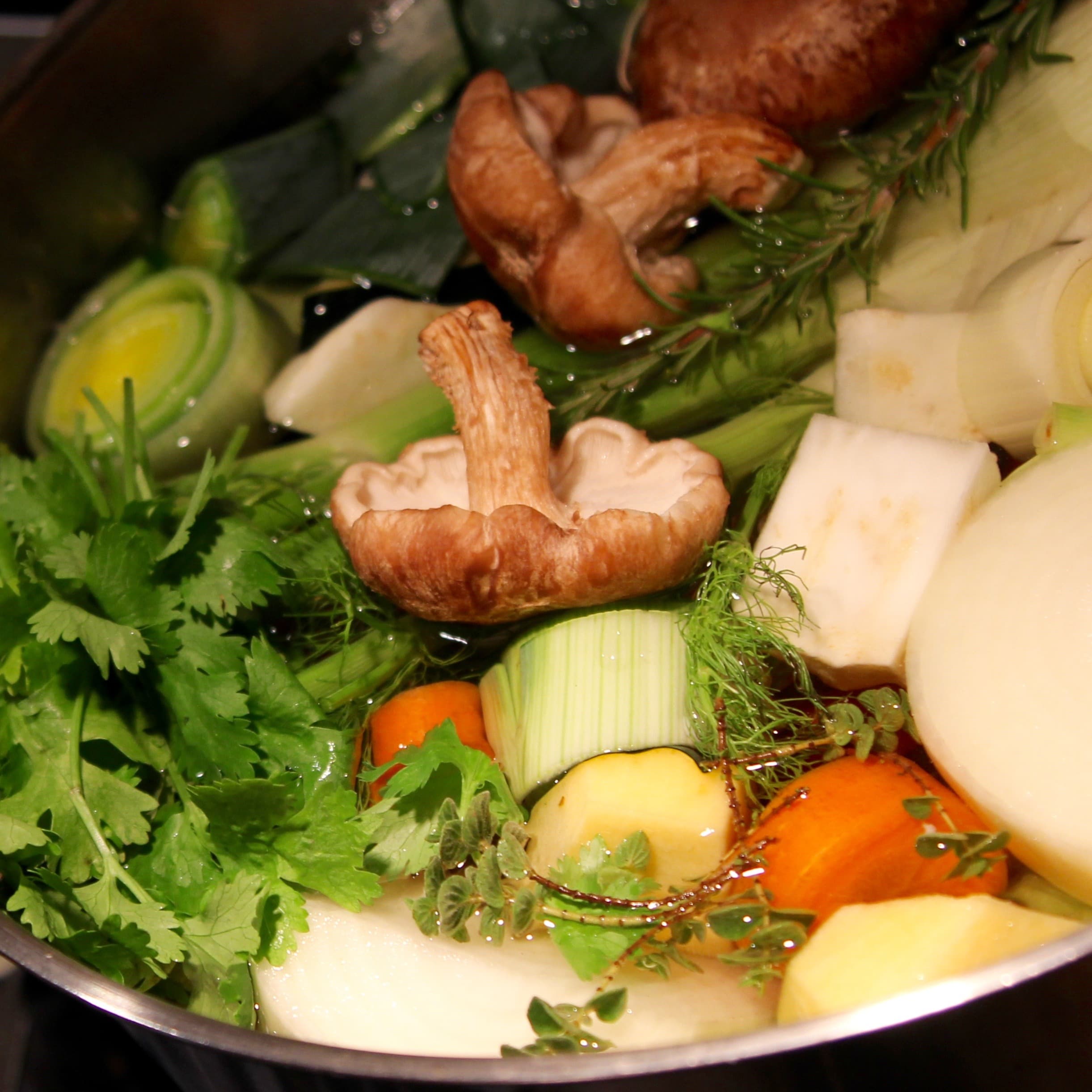 A pot of bone broth simmering
